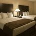 Boarders Inn & Suites by Cobblestone Hotels - Ashland City room with two beds and bedside lamp