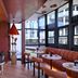 City Lodge Hotel Victoria and Alfred Waterfront bar and dining area in Cape Town with curved seating and large windows