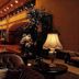 Euro Park Otel Istanbul lobby with leather seating, table lamp, and large mirrors