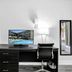 The Harrison Hotel Downtown Hollywood FL, an Ascend Collection Hotel desk with TV showing a pool and black chair