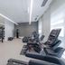 Tru by Hilton Lumberton fitness center with treadmills, weight racks and exercise machines