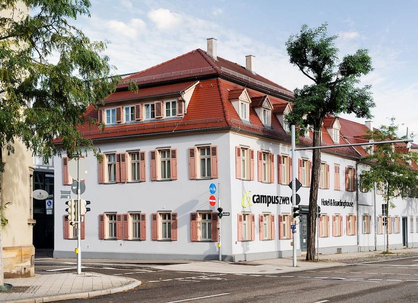 campuszwei Hotel & Boardinghouse in Ludwigsburg, street view of a white building with red roof and shutters