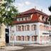 campuszwei Hotel & Boardinghouse in Ludwigsburg, street view of a white building with red roof and shutters