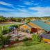 Zion Ponderosa Ranch Resort in Mount Carmel with cabins, patio seating, and scenic mountain views