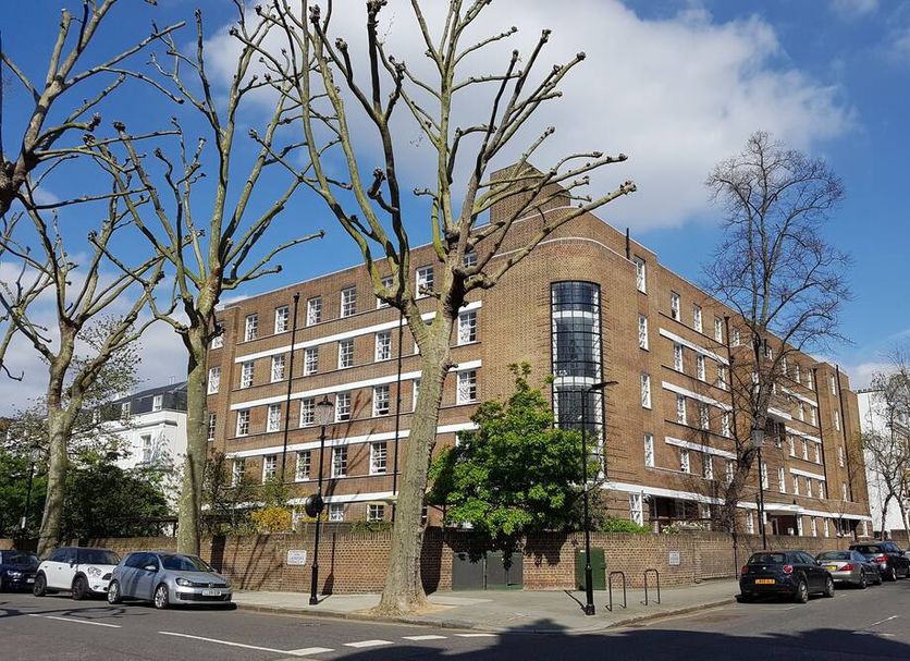 Bowden Court, London hotel exterior on a street with parked cars and bare trees