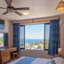 Hotel El Mirador in Puerto Escondido guest room with ocean view through large window