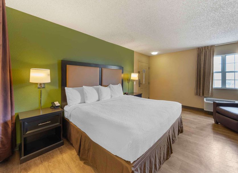 Extended Stay America Suites - Bakersfield - California Avenue room with king bed, window and armchair