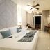 Evershine Resort & Spa, Mahabaleshwar: guest room with king bed, balcony, and wall-mounted TV