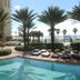 Shores of Panama Resort in Panama City Beach with pool, palm trees, and ocean view