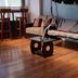 El Mirador de Santa Ana Cusco room with sofa, rocking chair and hanging daybed