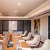 Mestil Hotel & Residences in Kampala boardroom with long conference table and upholstered chairs