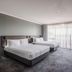 Heartland Hotel Auckland Airport in Mangere guest room with two beds and large window