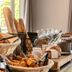 Breakfast buffet at Campanile Nature - Niort Est La Crèche in La Crèche with croissants, bread and pastries