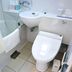 Hotel Shimbashi Sambankan Tokyo bathroom with compact toilet, sink, and shower area
