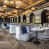 Europäischer Hof in Baden-Baden lounge with arched mirrors, lantern ceiling lights, and tufted seating