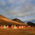 Svalbard Hotell | The Vault in Longyearbyen with colorful cabins and mountain landscape