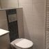 First Mountain Montafon in Gaschurn bathroom with wall-mounted toilet and heated towel rail