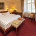 Romantik Parkhotel Wasserburg Anholt room in Isselburg with double bed, window seat and warm lamps