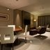 Hotel Nikko Tsukuba suite with seating area, TV, and floor lamp in Tsukuba