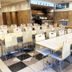 Dining area at Toyoko Inn Osaka Sakai-Higashi-Eki in Sakai with rows of white tables and chairs