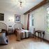 Pensión Landazuri in Granada, twin room with two beds and large windows overlooking greenery