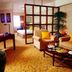 Yun-Zen Jinling World Trade Plaza Hotel in Shijiazhuang suite with sitting area and bedroom