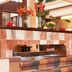 Sheraton Atlanta Airport Hotel lobby with mosaic-tiled steps, floral arrangements, and seating area