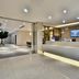 Hanting Express Hangzhou Cuiyuan Branch lobby with front desk and seating in Hangzhou