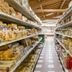 Del Garda Village and Camping in Peschiera del Garda supermarket aisle with stocked shelves and tiled floor