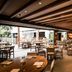 Nobu Hotel Marbella dining room in Marbella with wooden ceiling beams and open terrace seating