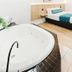 Country 2 Coast Motor Inn Coffs Harbour room with spa bathtub and bed