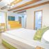 Safrano Palace in Braşov guest room with wood-beam ceiling and twin beds