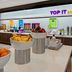 Tru by Hilton Austin Airport breakfast area with fruit bowls and beverage station in Austin