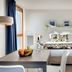 Teneo Apparthotel Bordeaux Maritime room with bed, kitchenette and table, Bordeaux