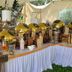 Hotel Troy Nairobi buffet station with gold chafing dishes, drink dispensers and wooden display stands