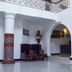 Kingsbridge Royale Hotel Accra lobby with reception desk, arched doorway and seating area