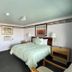 Best Motel Bowling Green room with queen bed, TV, nightstand and wall art