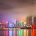 Haiqing Hotel in Qingdao with colorful waterfront skyline reflections at night