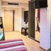 Hospedium Hotel Vittoria Colonna room in Medina de Ríoseco with wardrobe, wall TV and mirror