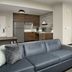 Residence Inn by Marriott Doral Mall Area suite with kitchen, sofa, and king bed in Doral