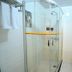 Super 8 by Wyndham Pingyao Railway Station Shun Cheng Lu bathroom with glass shower and toilet in Jinzhong