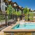 Eagleridge Lodge & Townhomes in Steamboat Springs with an outdoor hot tub and mountain lodge courtyard