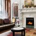 Night Hotel Broadway in New York, elegant lounge with ornate fireplace and bookshelves