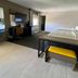 Comfort Inn Rutland - Killington guest room with two beds, desk, TV, and seating bench in Rutland