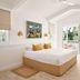 Atlantic Byron Bay room with king bed, tropical artwork, and balcony view in Byron Bay