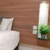 The Leverage Business Hotel - Bandar Baru Mergong room with bed, wood-paneled headboard, and bedside shelf in Alor Setar