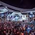 Ibiza Rocks Hotel in Sant Antoni de Portmany with a crowded nighttime poolside concert and stage lights