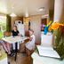 hu I Pini village in Fiano Romano, guests seated at a table in a bright cabin-style room