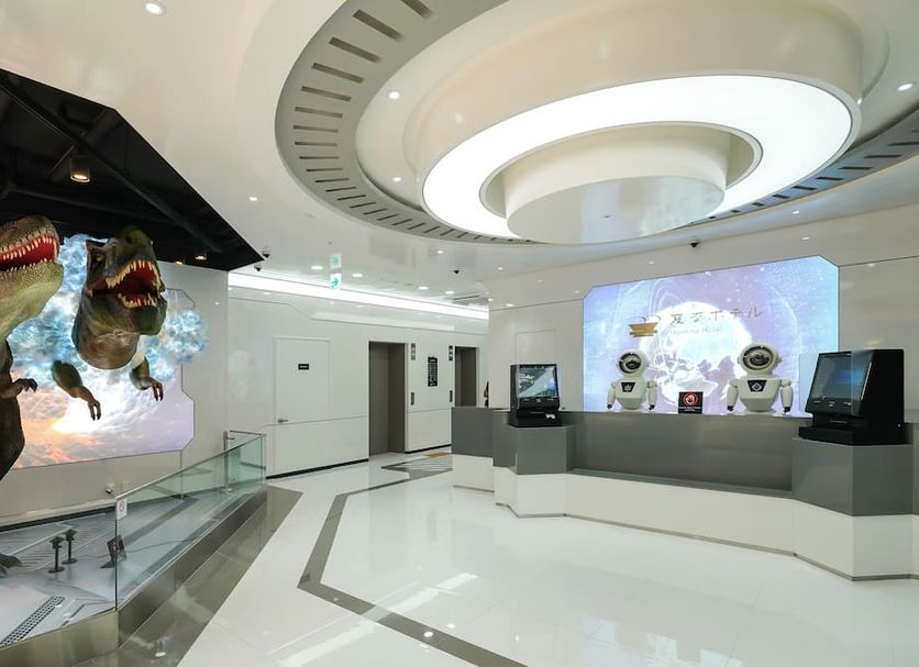 Henn na Hotel Seoul Myeongdong lobby with robot reception desk and dinosaur figures in Seoul