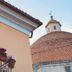 Ristorante Hotel Lucia in Giulianova with balcony flowers and a domed church tower nearby